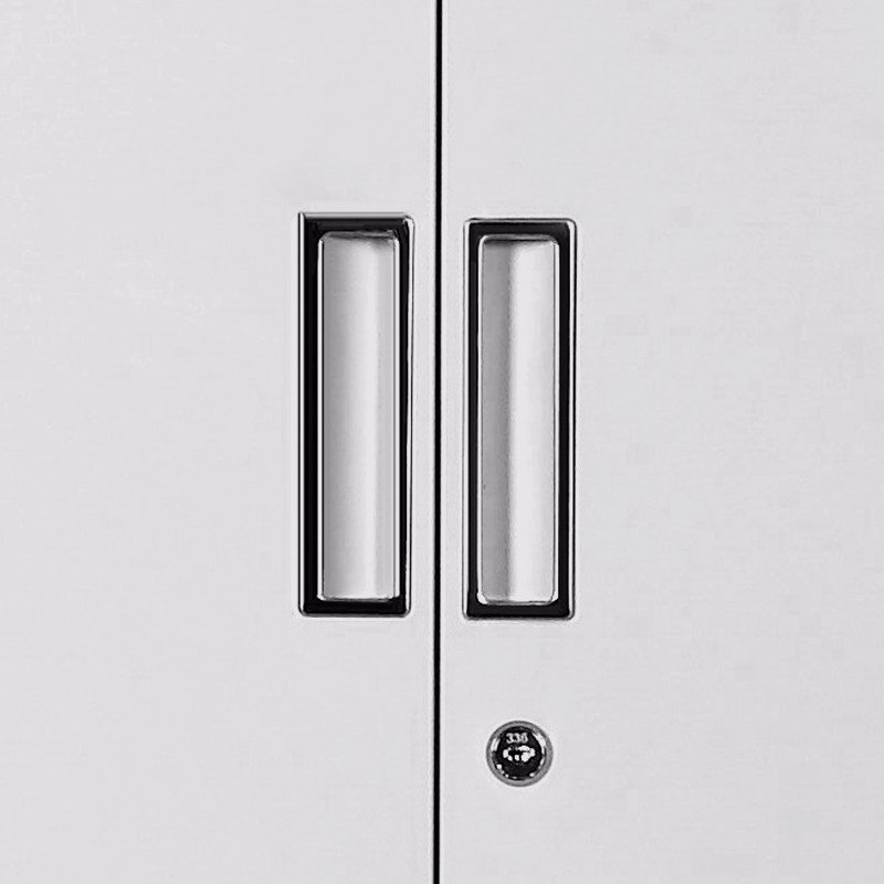 Recessed handles and lock detail on a steel office cabinet
